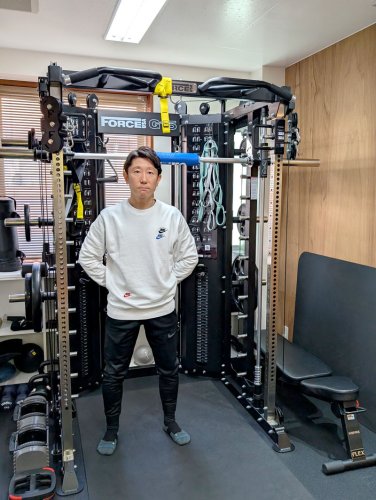 佐藤社長とトレーニングルーム